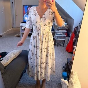 1. State Women’s Floral V Neck Button Down Tie Midi Dress